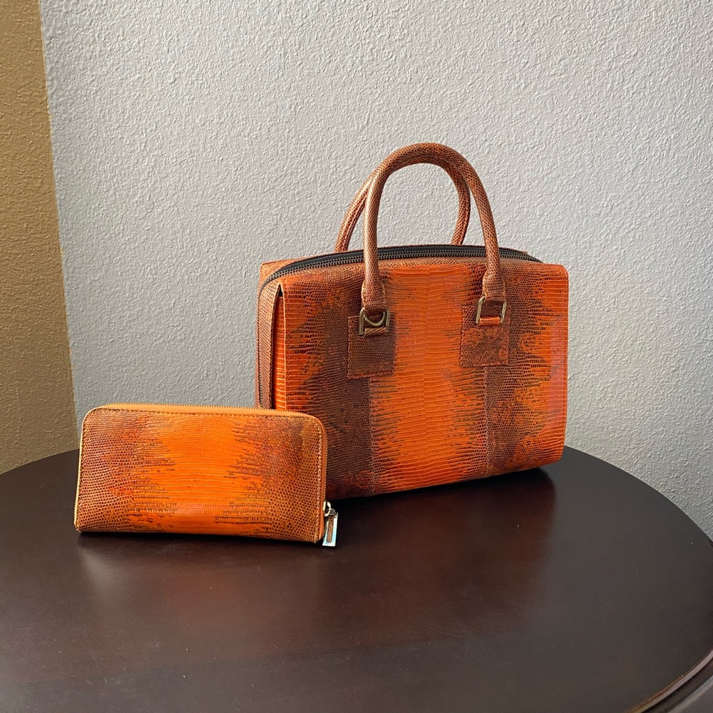 Brand new.  Never worn.  Python purse and wallet